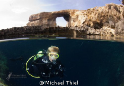 Diver in the Blue Hole, Maltese Islands (on Gozo), with t... by Michael Thiel 